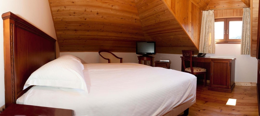 Imagen de la habitación del Hotel Villa Filaus. Foto 6