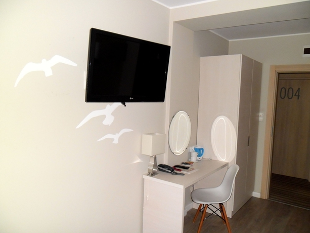 Imagen de la habitación del Hotel Villa Flaming. Foto 3