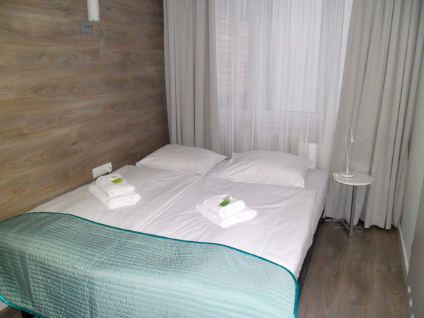 Imagen de la habitación del Hotel Villa Flaming. Foto 7