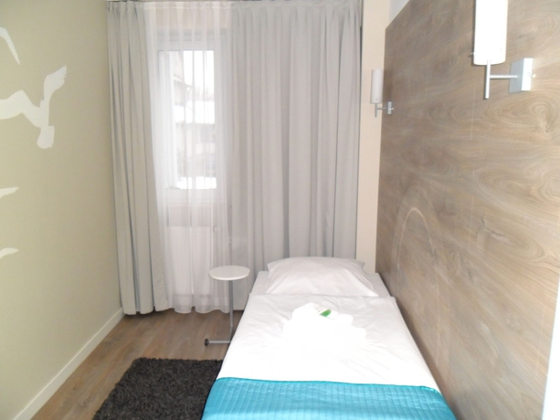 Imagen de la habitación del Hotel Villa Flaming. Foto 8