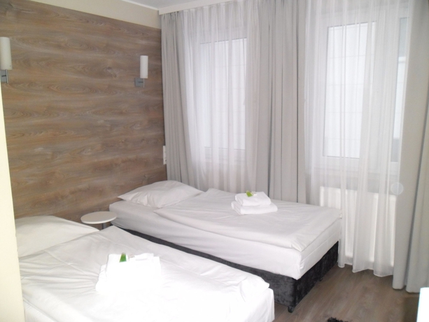 Imagen de la habitación del Hotel Villa Flaming. Foto 9