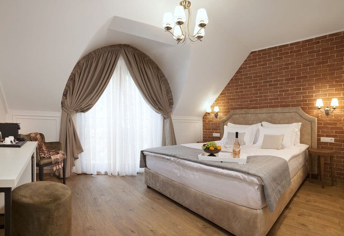 Imagen de la habitación del Hotel Villa Flavia Heritage Boutique. Foto 4