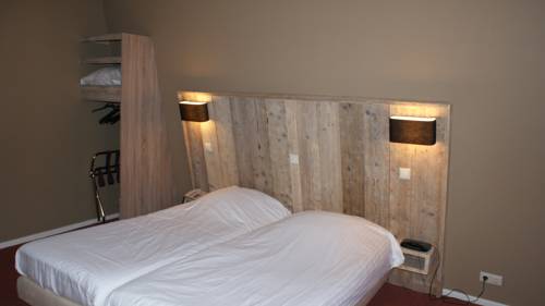 Imagen de la habitación del Hotel Villa Flora. Foto 5