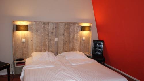 Imagen de la habitación del Hotel Villa Flora. Foto 11