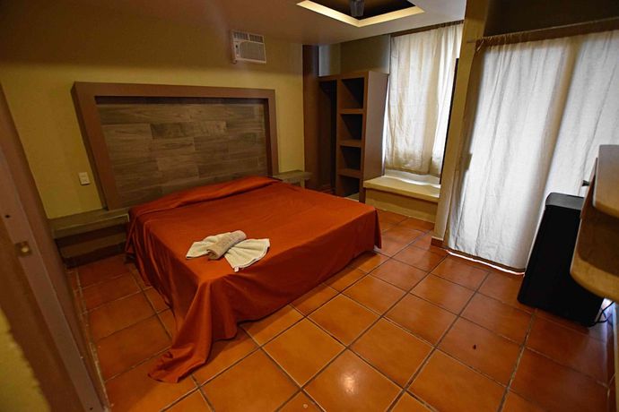 Imagen de la habitación del Hotel Villa Flores. Foto 4