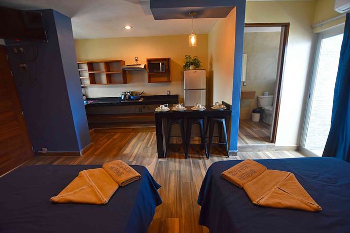 Imagen de la habitación del Hotel Villa Flores. Foto 7