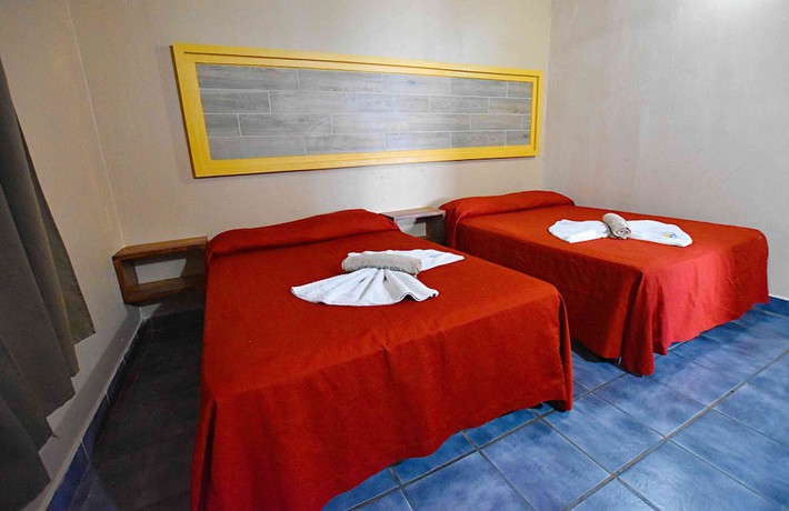 Imagen de la habitación del Hotel Villa Flores. Foto 11