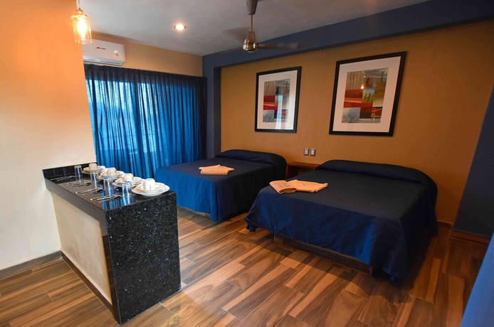 Imagen de la habitación del Hotel Villa Flores. Foto 13