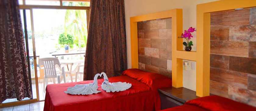 Imagen de la habitación del Hotel Villa Flores. Foto 17