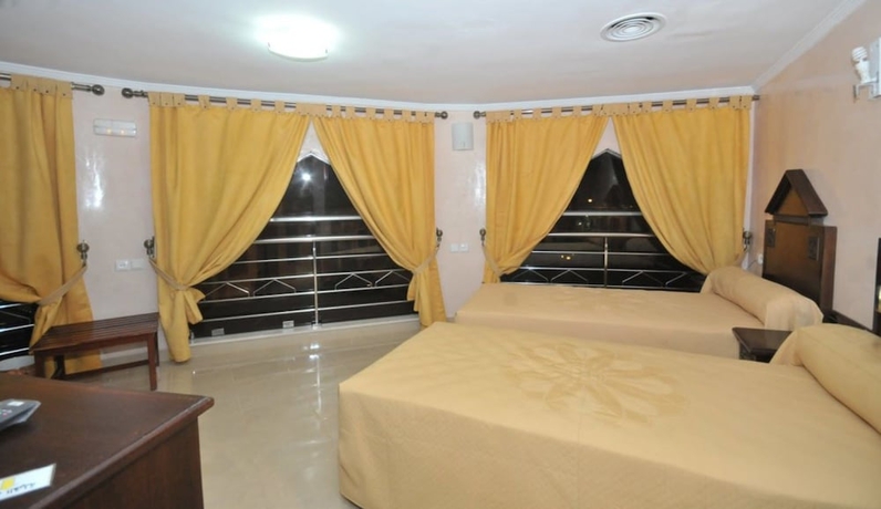 Imagen de la habitación del Hotel Villa Florido. Foto 13