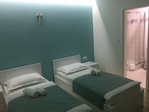 Imagen de la habitación del Hotel Villa Flowers. Foto 11