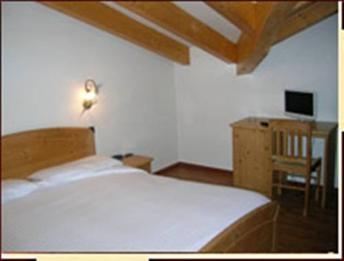 Imagen de la habitación del Hotel Villa Fosine. Foto 8