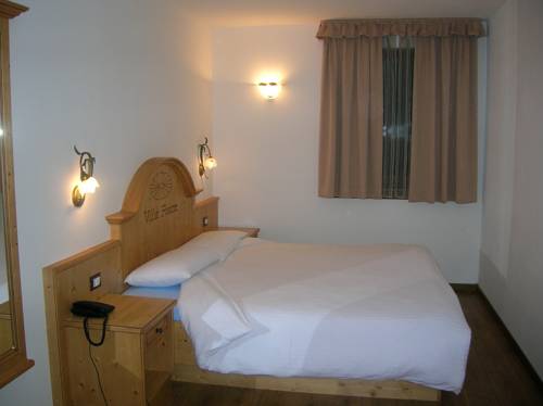 Imagen de la habitación del Hotel Villa Fosine. Foto 9