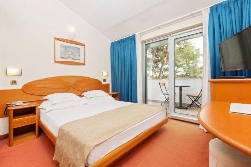 Imagen de la habitación del Hotel Villa Galijot Plava Laguna. Foto 7