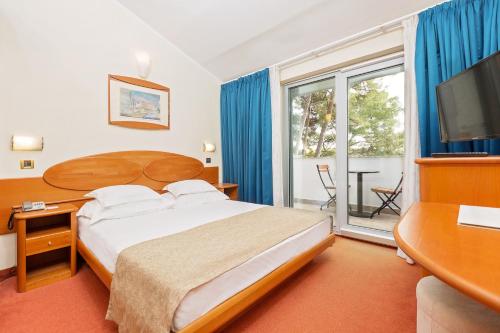Imagen de la habitación del Hotel Villa Galijot Plava Laguna. Foto 8