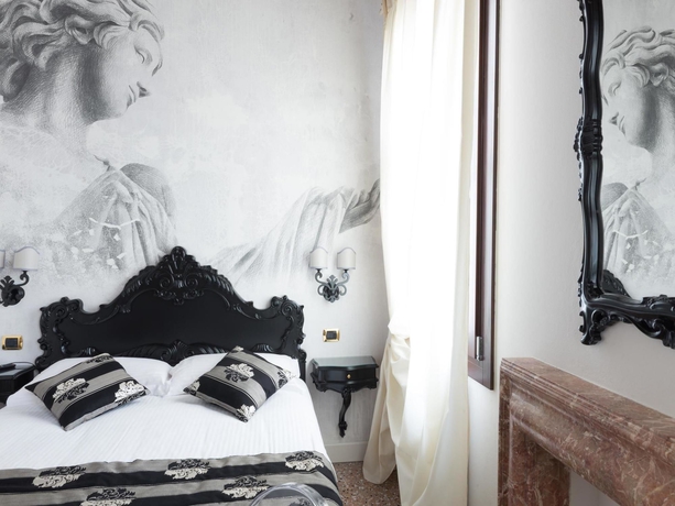 Imagen de la habitación del Hotel Villa Gasparini. Foto 8