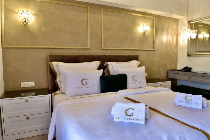 Imagen de la habitación del Hotel Villa Giardino Heritage Boutique Bol. Foto 3