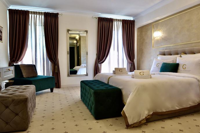 Imagen de la habitación del Hotel Villa Giardino Heritage Boutique Bol. Foto 6