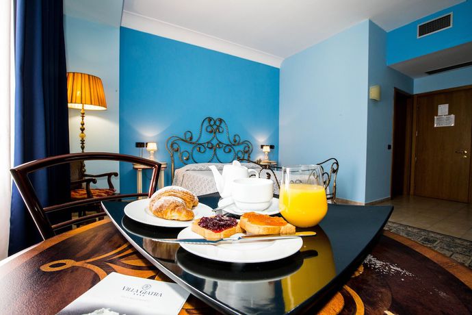 Imagen de la habitación del Hotel Villa Giatra. Foto 4