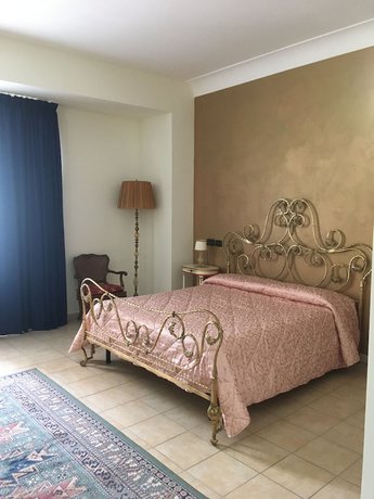 Imagen de la habitación del Hotel Villa Giatra. Foto 9