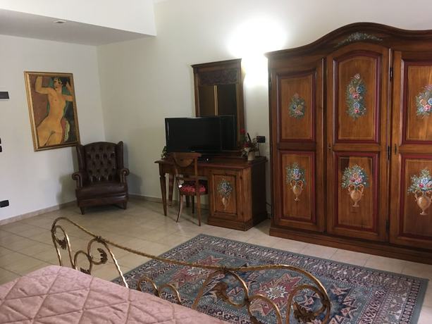 Imagen de la habitación del Hotel Villa Giatra. Foto 11