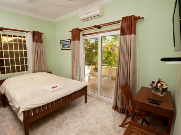 Imagen de la habitación del Hotel Villa Grange. Foto 14
