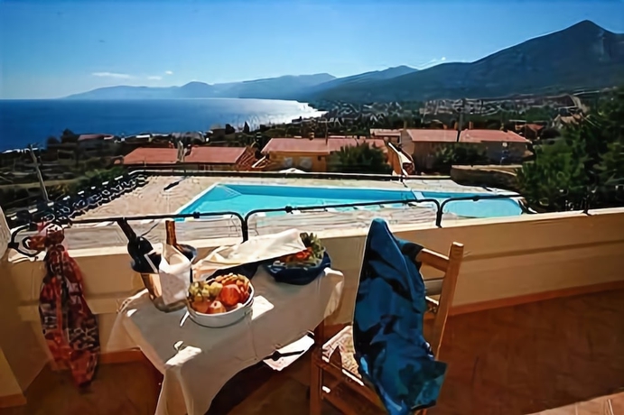 Imagen de la habitación del Hotel Villa Gustui Maris. Foto 3