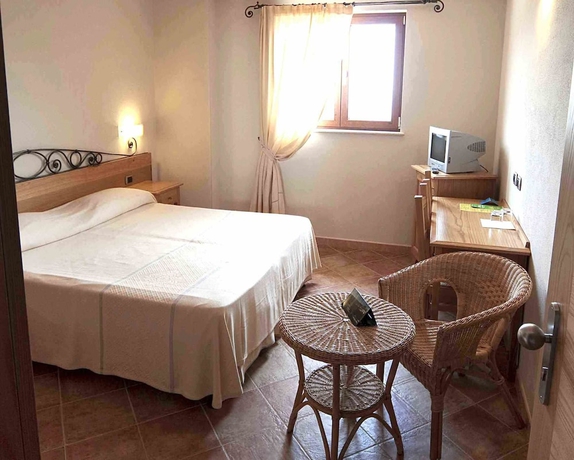 Imagen de la habitación del Hotel Villa Gustui Maris. Foto 5