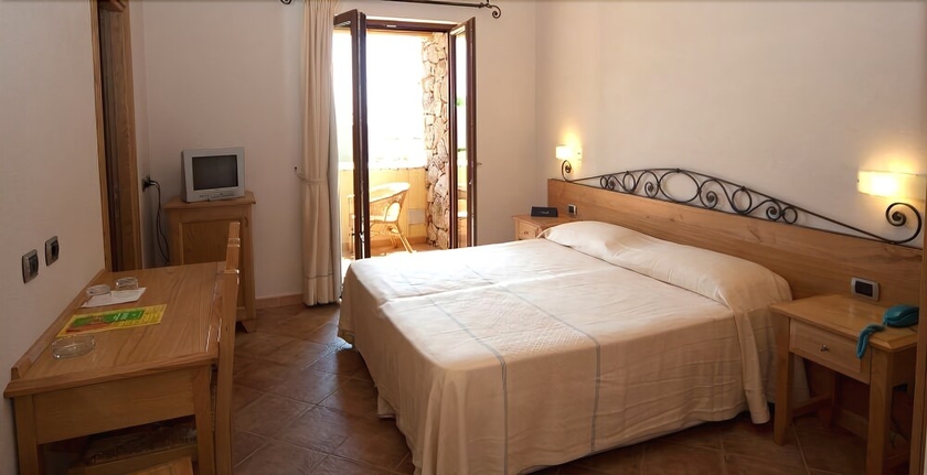 Imagen de la habitación del Hotel Villa Gustui Maris. Foto 7