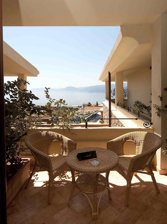 Imagen de la habitación del Hotel Villa Gustui Maris. Foto 12