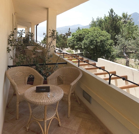 Imagen de la habitación del Hotel Villa Gustui Maris. Foto 14