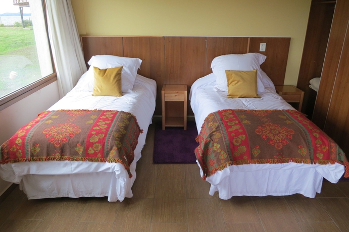 Imagen de la habitación del Hotel Villa Huapi Resort. Foto 9