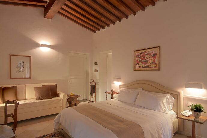 Imagen de la habitación del Hotel Villa I Barronci Resort and Spa. Foto 14