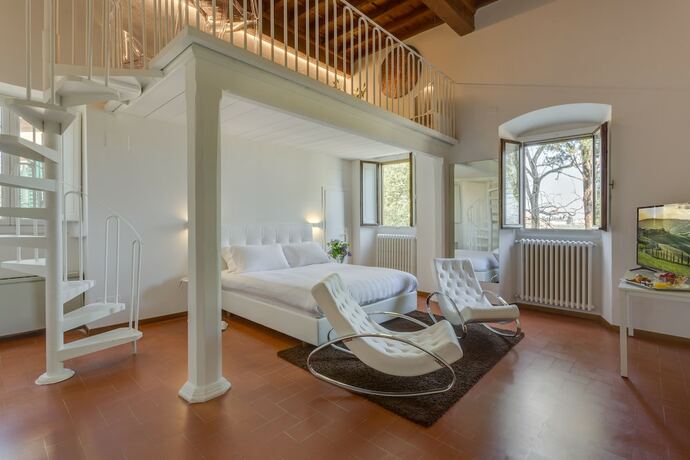 Imagen de la habitación del Hotel Villa I Barronci Resort and Spa. Foto 15