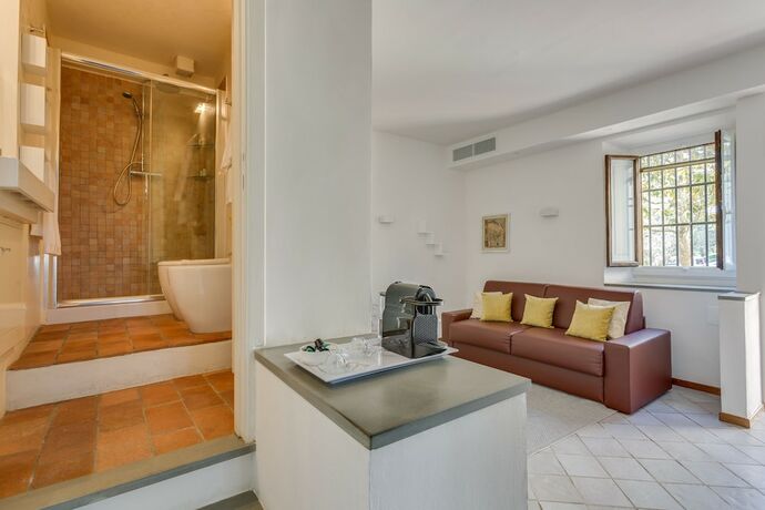 Imagen de la habitación del Hotel Villa I Barronci Resort and Spa. Foto 20