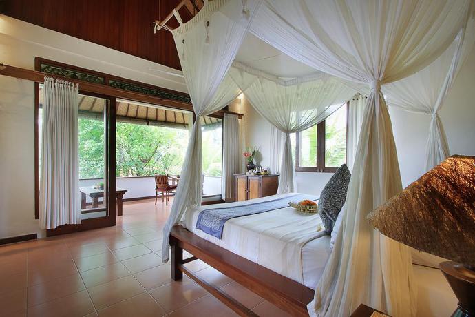 Imagen de la habitación del Hotel Villa Ibu Rama Ubud. Foto 8