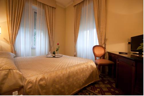 Imagen de la habitación del Hotel Villa Ida. Foto 11