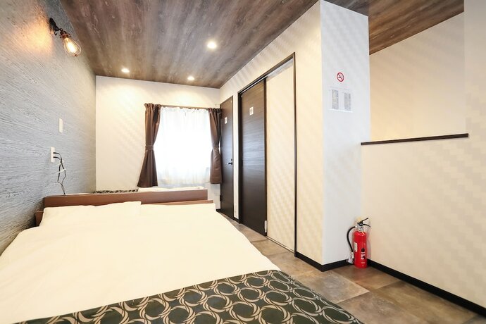Imagen de la habitación del Hotel Villa Ikebukuro Altair. Foto 16