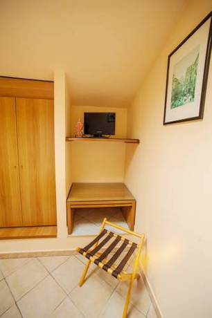 Imagen de la habitación del Hotel Villa Il Castagno. Foto 10