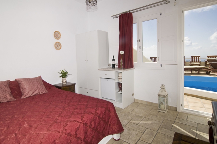 Imagen de la habitación del Hotel Villa Ilias Caldera. Foto 10