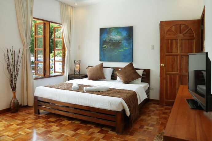 Imagen de la habitación del Hotel Villa In Blue. Foto 22
