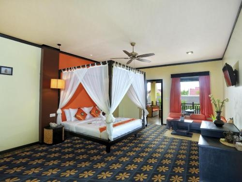 Imagen de la habitación del Hotel Villa Indochine D'angkor. Foto 6