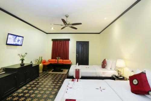 Imagen de la habitación del Hotel Villa Indochine D'angkor. Foto 7
