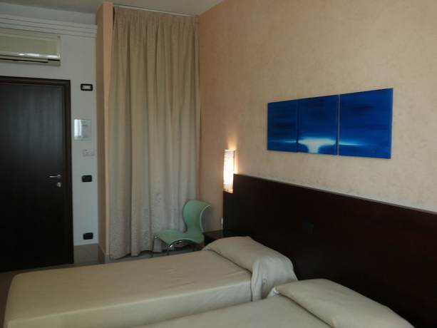 Imagen de la habitación del Hotel Villa Ionia. Foto 13