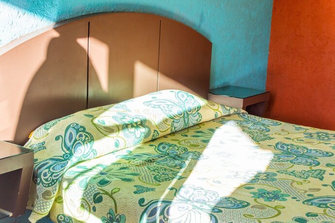 Imagen de la habitación del Hotel Villa Jardines. Foto 16