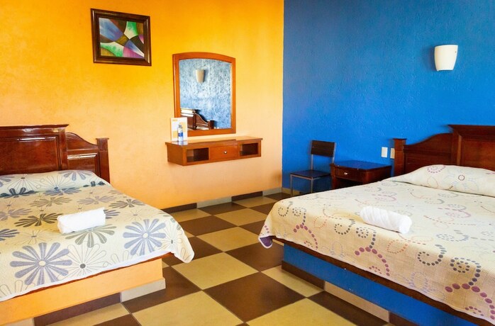 Imagen de la habitación del Hotel Villa Jardines. Foto 17