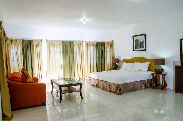 Imagen de la habitación del Hotel Villa Juanita, Happy Grove. Foto 11