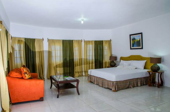 Imagen de la habitación del Hotel Villa Juanita, Happy Grove. Foto 13