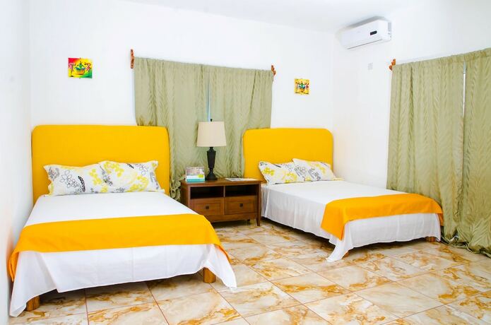 Imagen de la habitación del Hotel Villa Juanita, Happy Grove. Foto 16