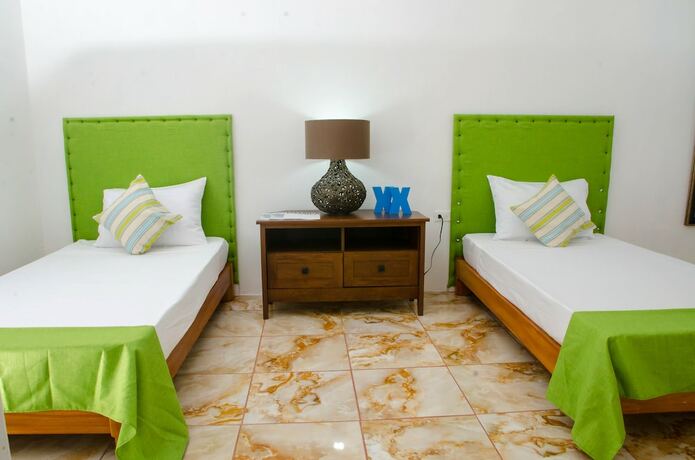 Imagen de la habitación del Hotel Villa Juanita, Happy Grove. Foto 18